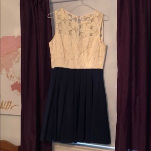 Navy blue and cream lace dress from Altar’d State